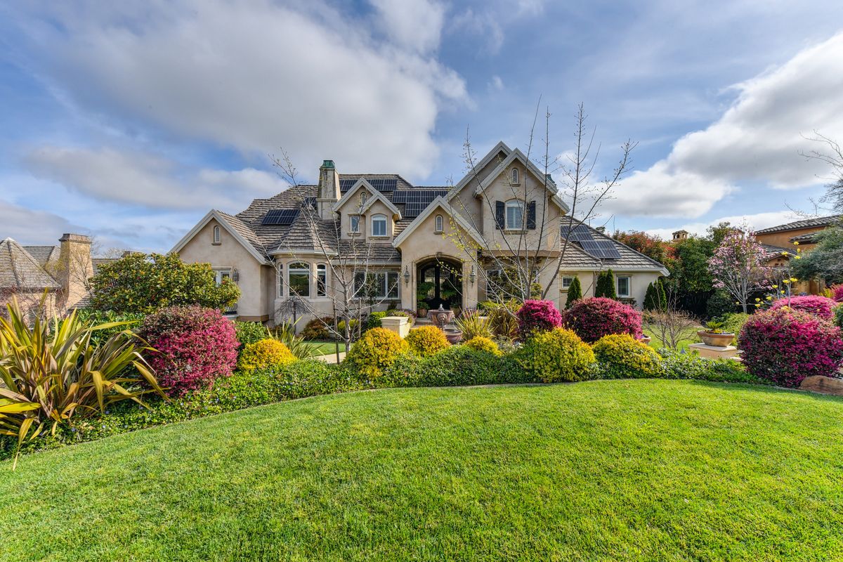 Stately American home with manicured gardens